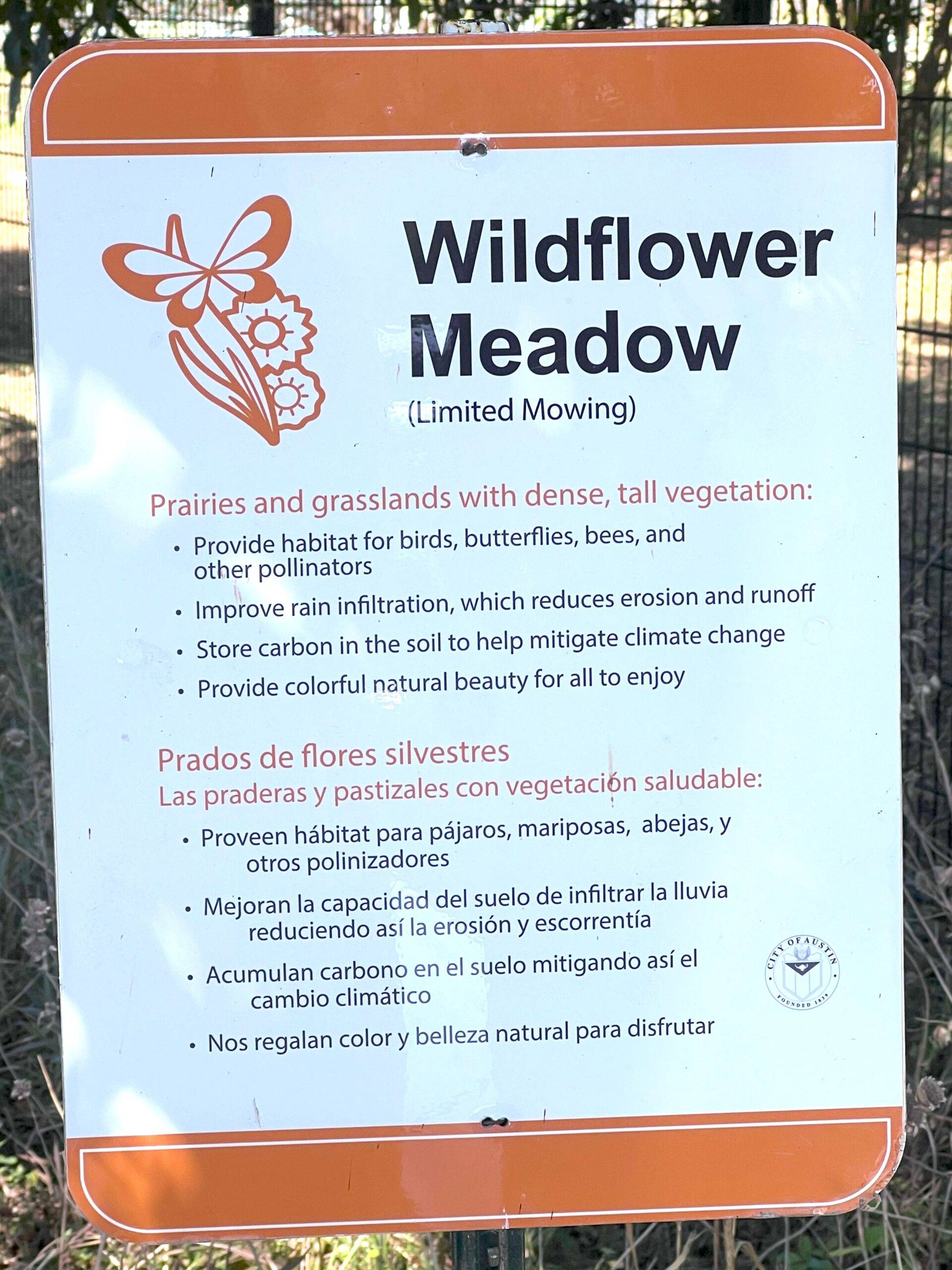 A sign reading "Wildflower Meadow"