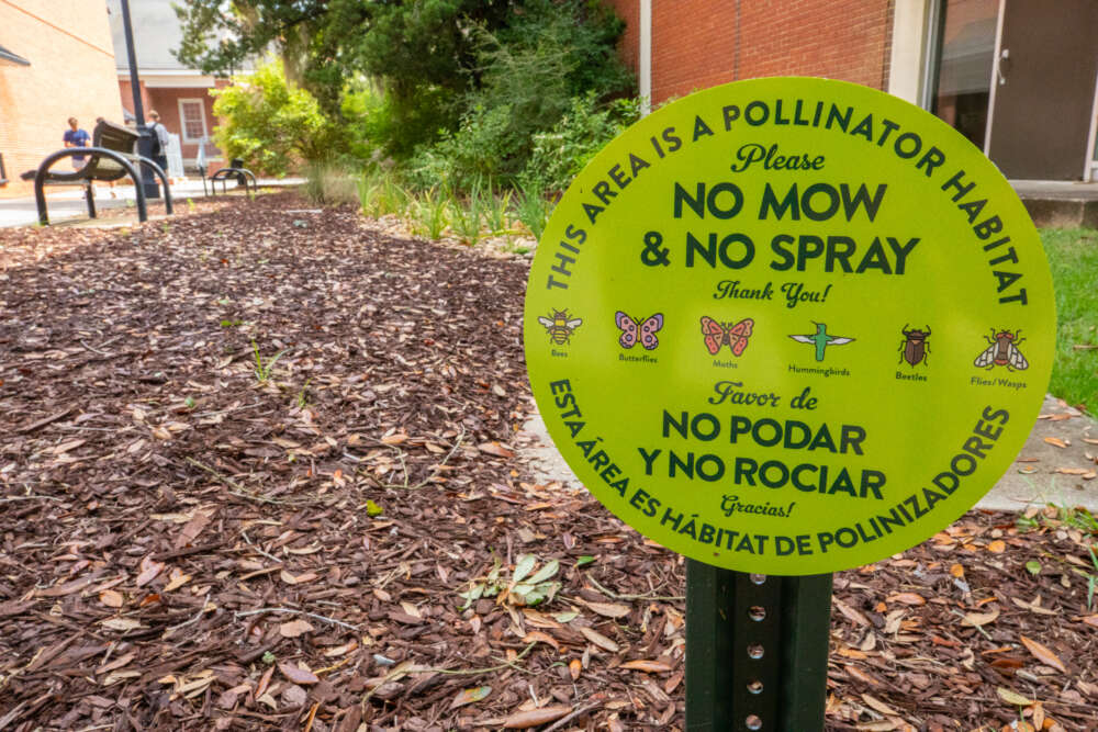 A sign reading "No Mow & No Spray".